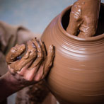 Doug Fitch and Hannah McAndrew making a jug for me